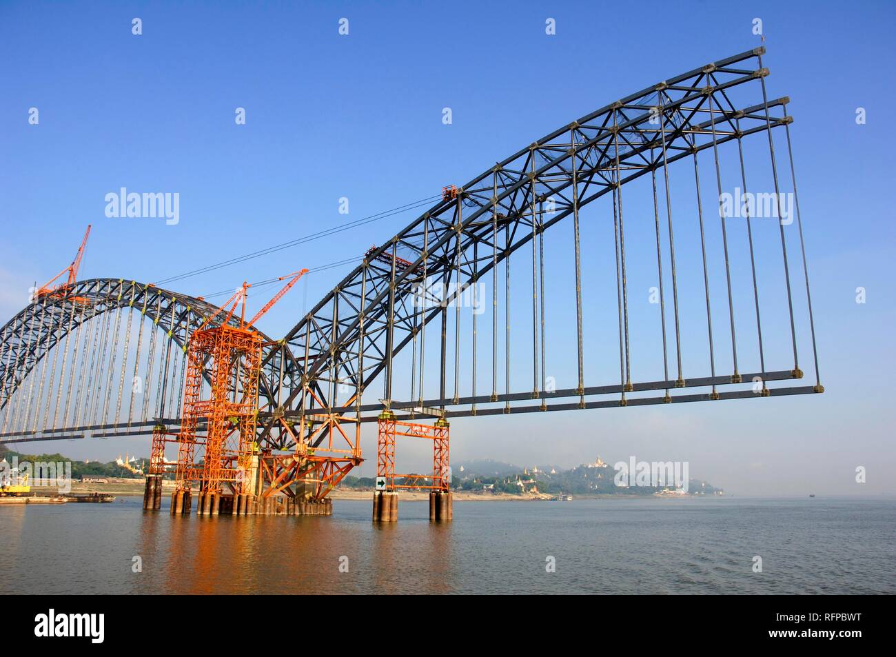 Construction of a new bridge crossing river Irawaddy in Myanmar near Ava, Burma Stock Photo