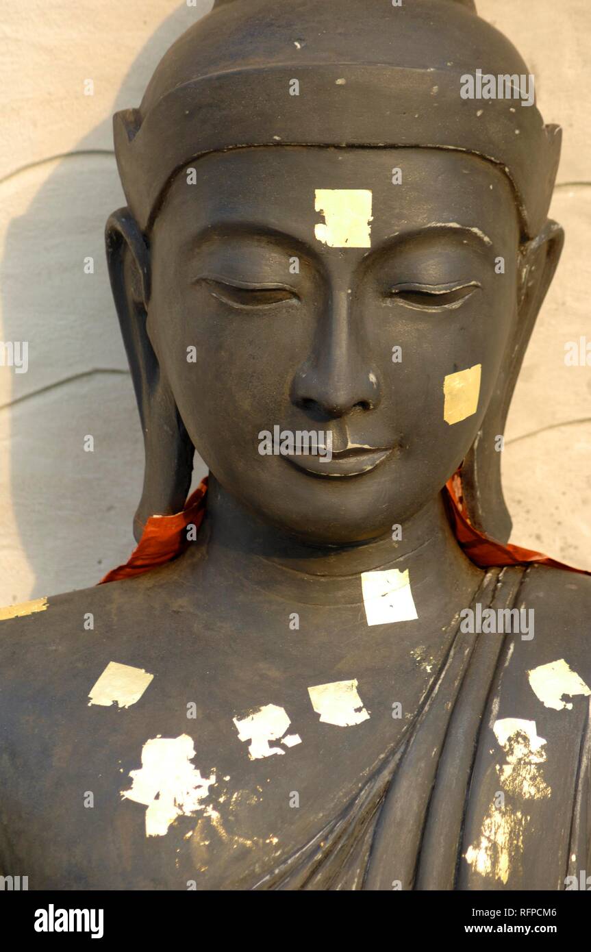 Buddha with gold leaves, Shwedagon, Yangon, Myanmar, Burma Stock Photo