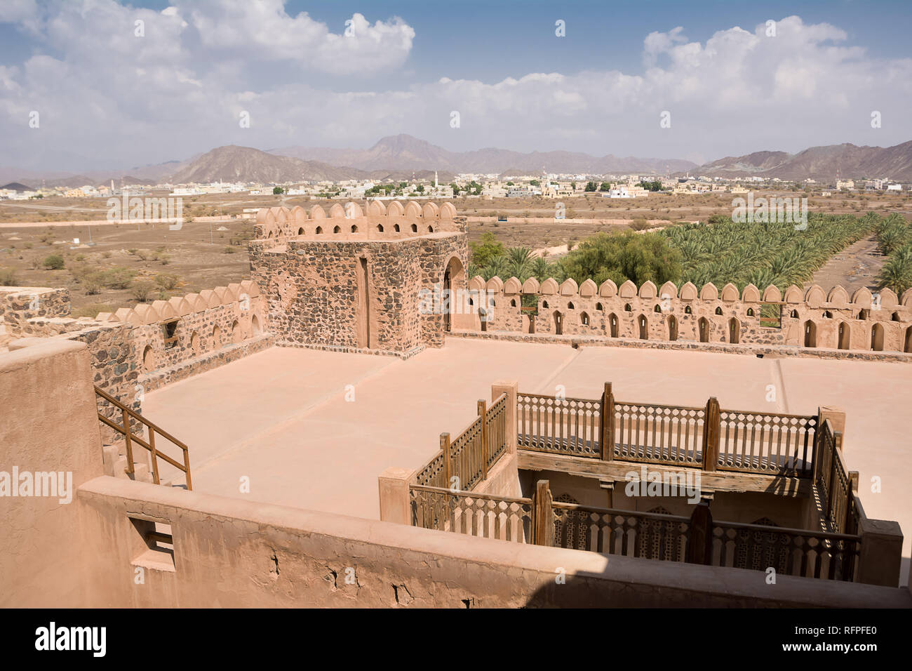 Terrace of the fort of Jabrin and in the background of Bahla and date crops (Oman) Stock Photo