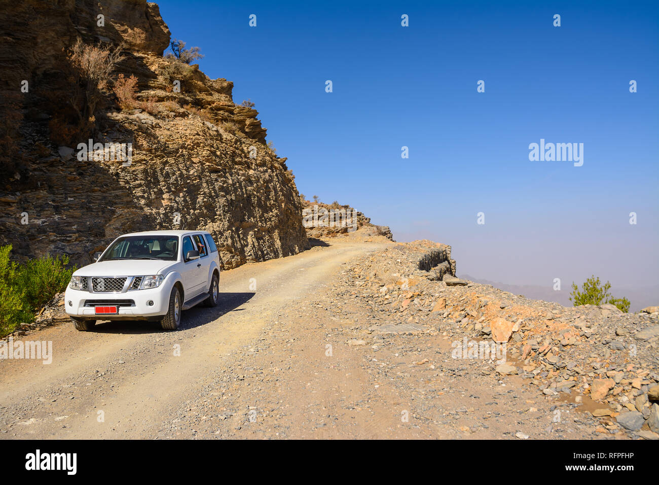 Off-road vehicle on the Jebel Shams mountains Stock Photo