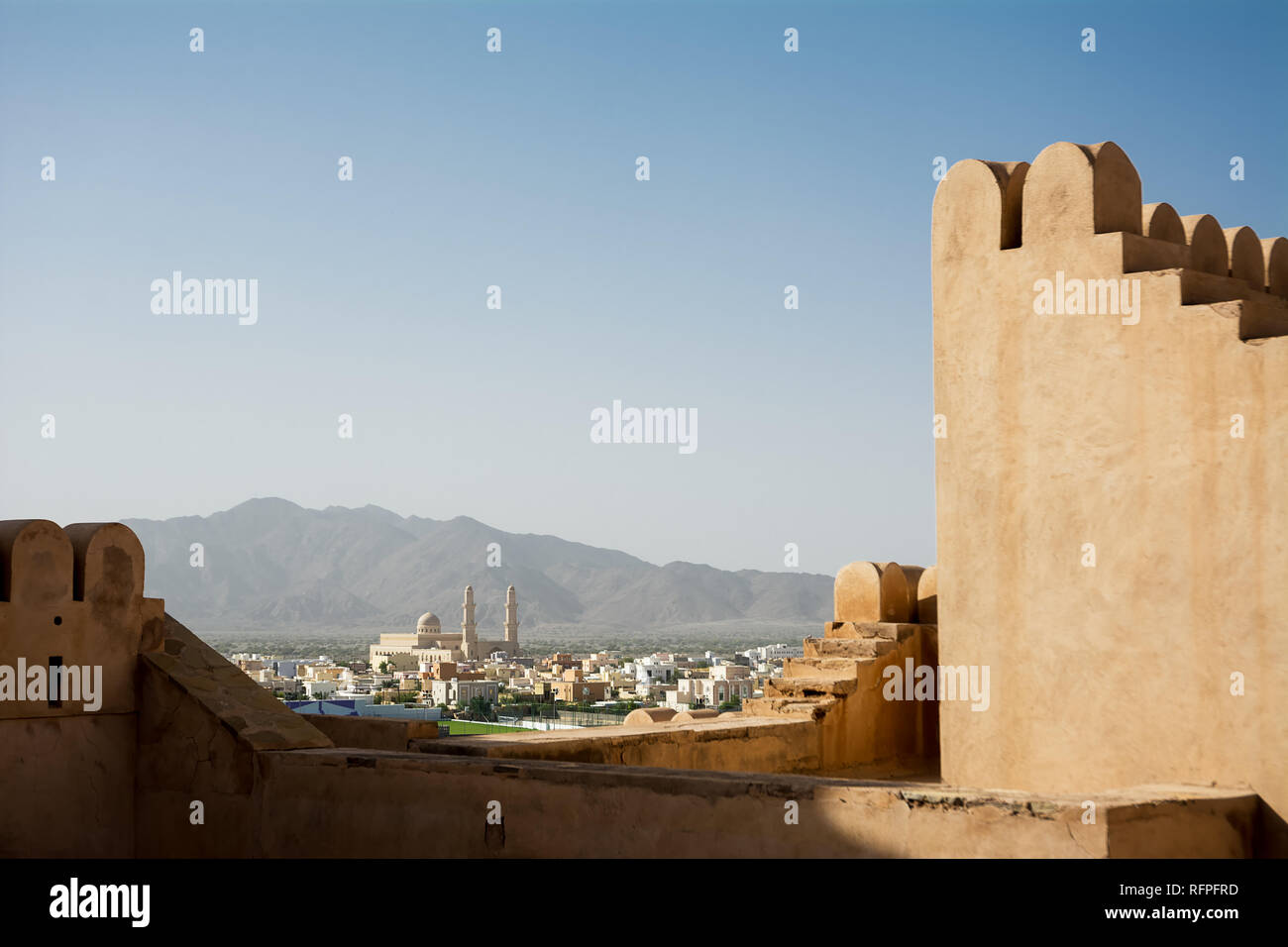 Nakhal Mosquea seen from the crenellated walls of the fort (Oman) Stock Photo