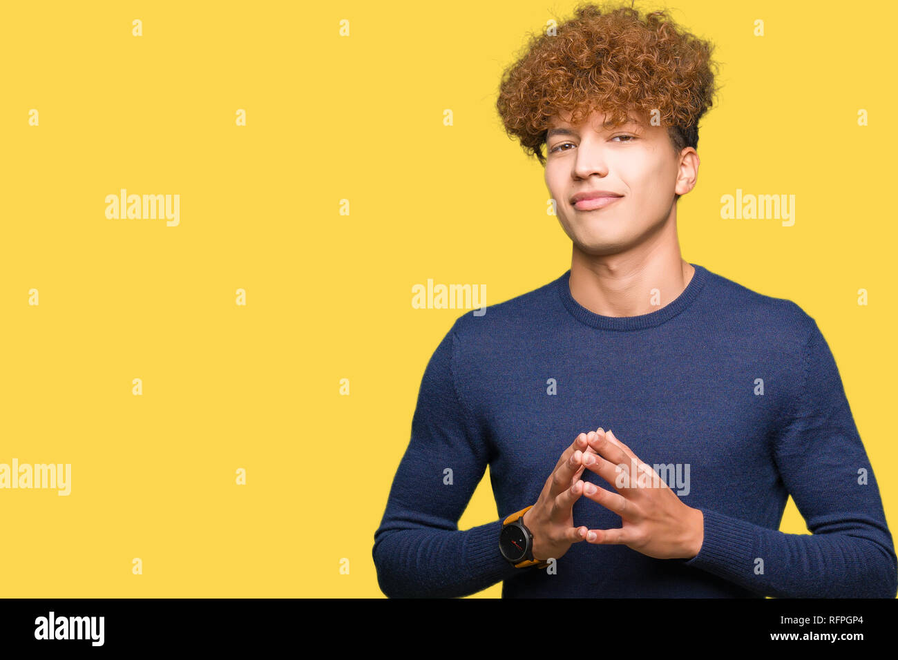 Young Handsome Man With Afro Hair Hands Together And Fingers