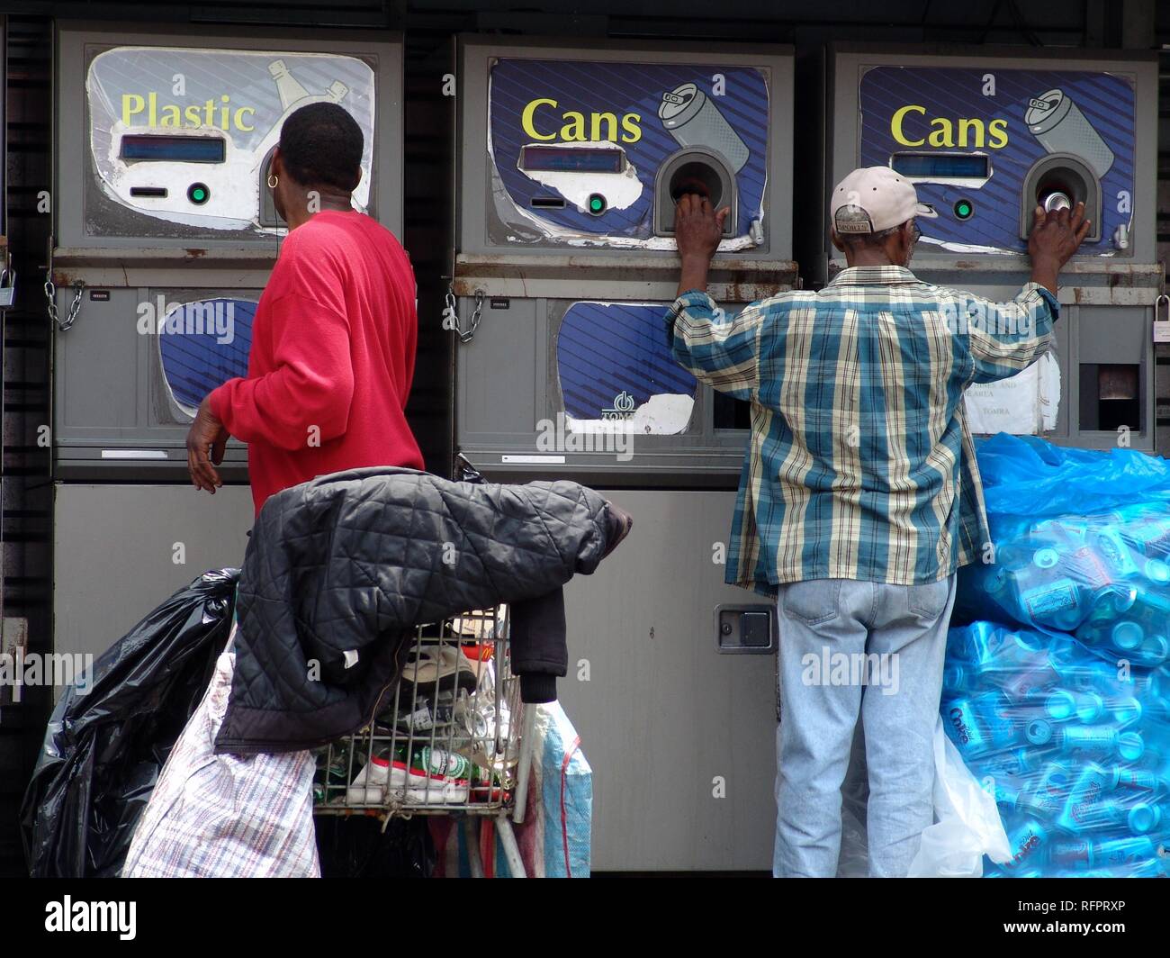 USA, United States of America, New York City: Harlem, 125th Street, Refund mashines for cans and bottles, collected by people. Stock Photo