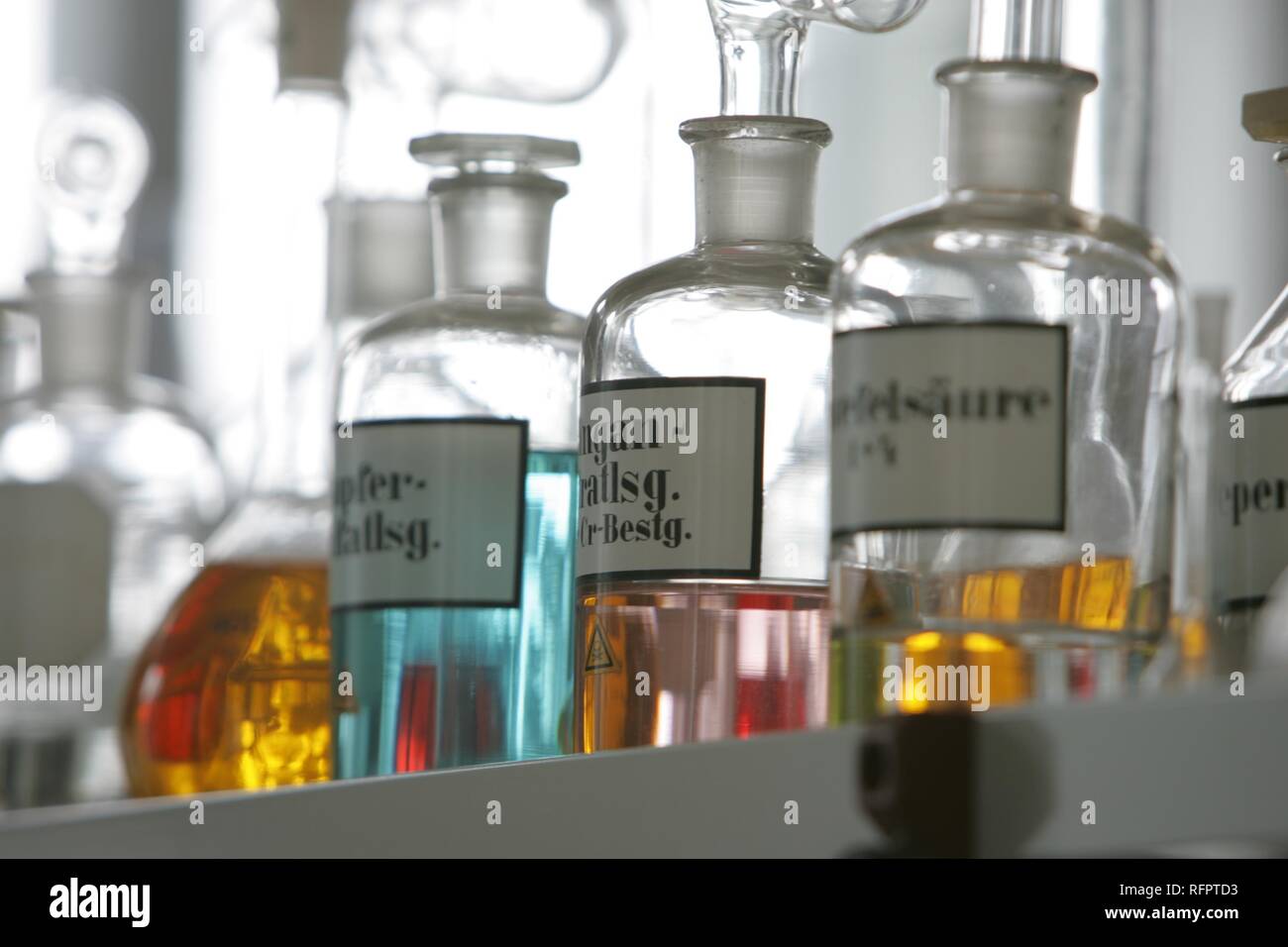 DEU, Germany: Bottles, apparatus, chemical in a chemical laboratory. Stock Photo