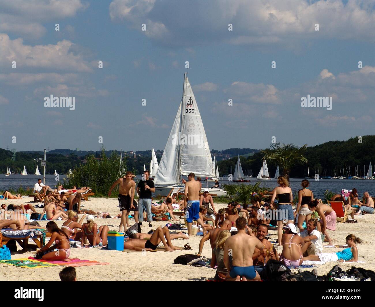 DEU, Germany, Essen : Baldeneysee lake, river Ruhr. Artificial sand beach for chilling and fun at the Ruhr shore. Seaside Beach Stock Photo