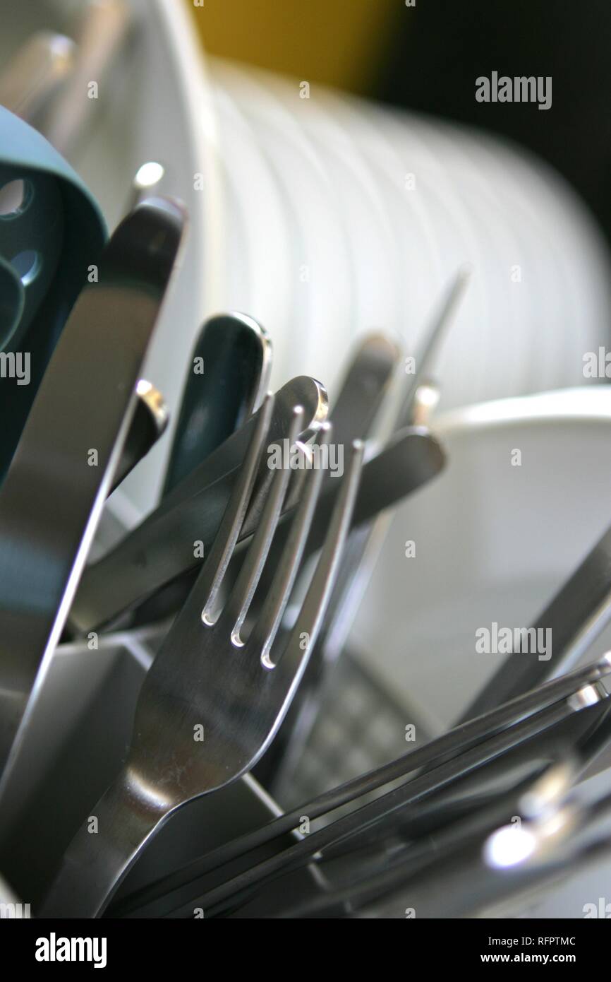 DEU, Germany: Clean dishes in a dishwasher. Stock Photo