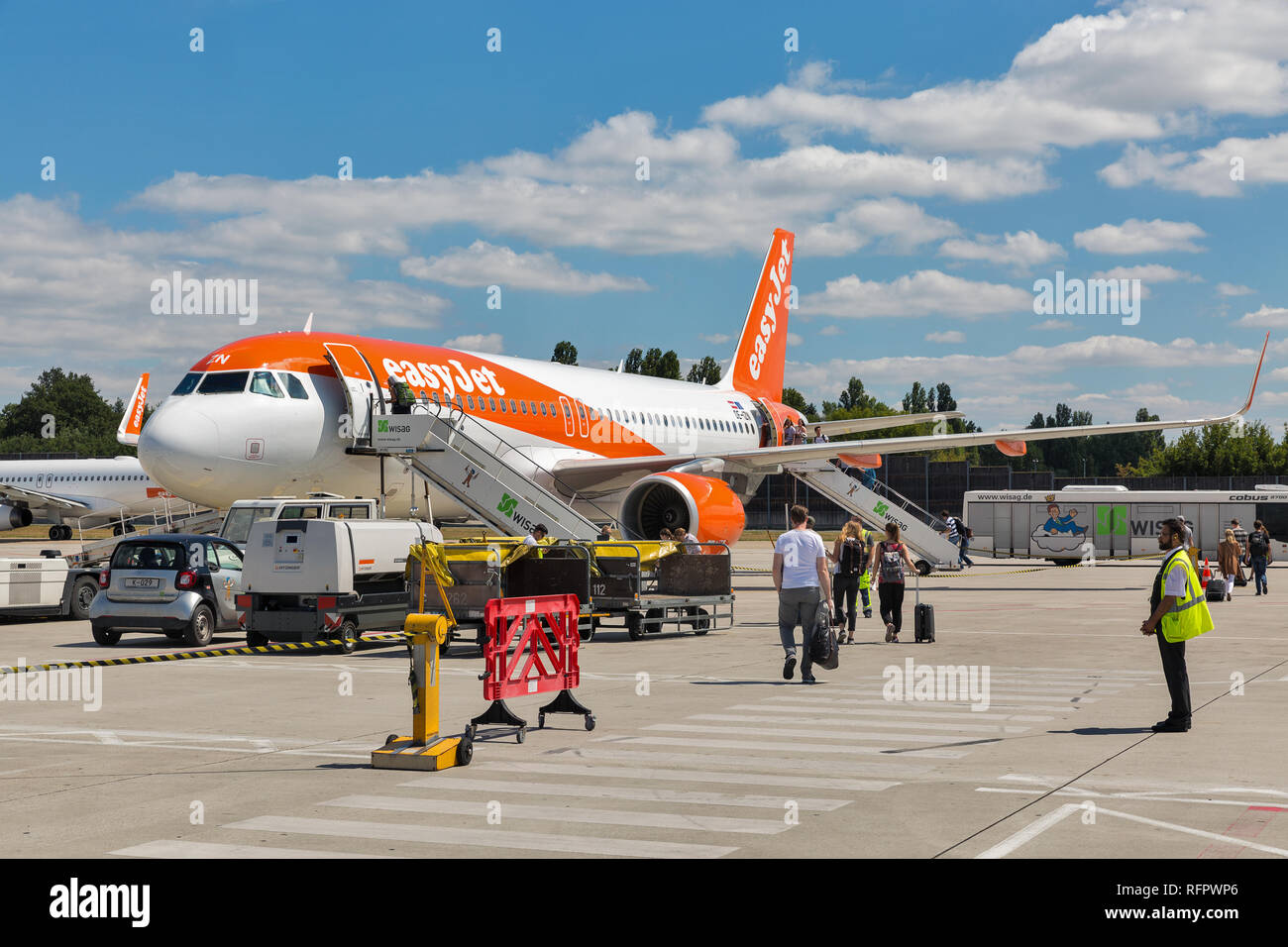 BERLIN, GERMANY JULY 15, 2018 Passengers depart at EasyJet Airbus