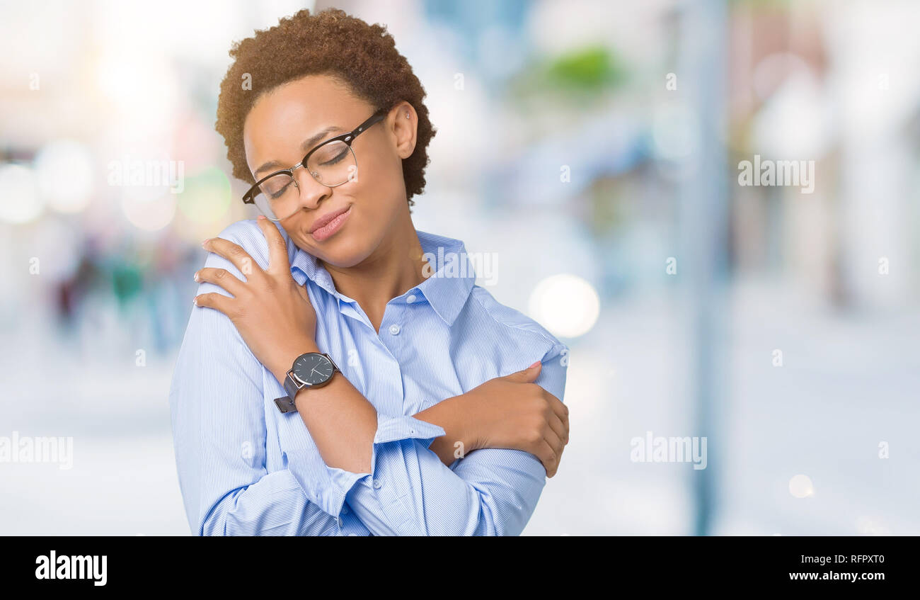 Young beautiful african american business woman over isolated ...