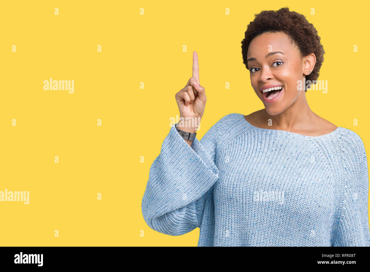 Young beautiful african american woman wearing a sweater over isolated ...