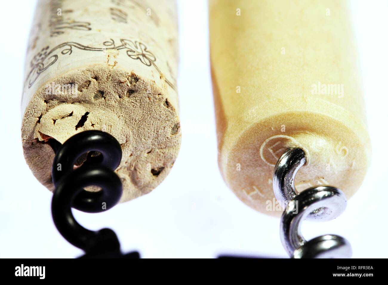 Natural cork and artificial cork with cork screw Stock Photo