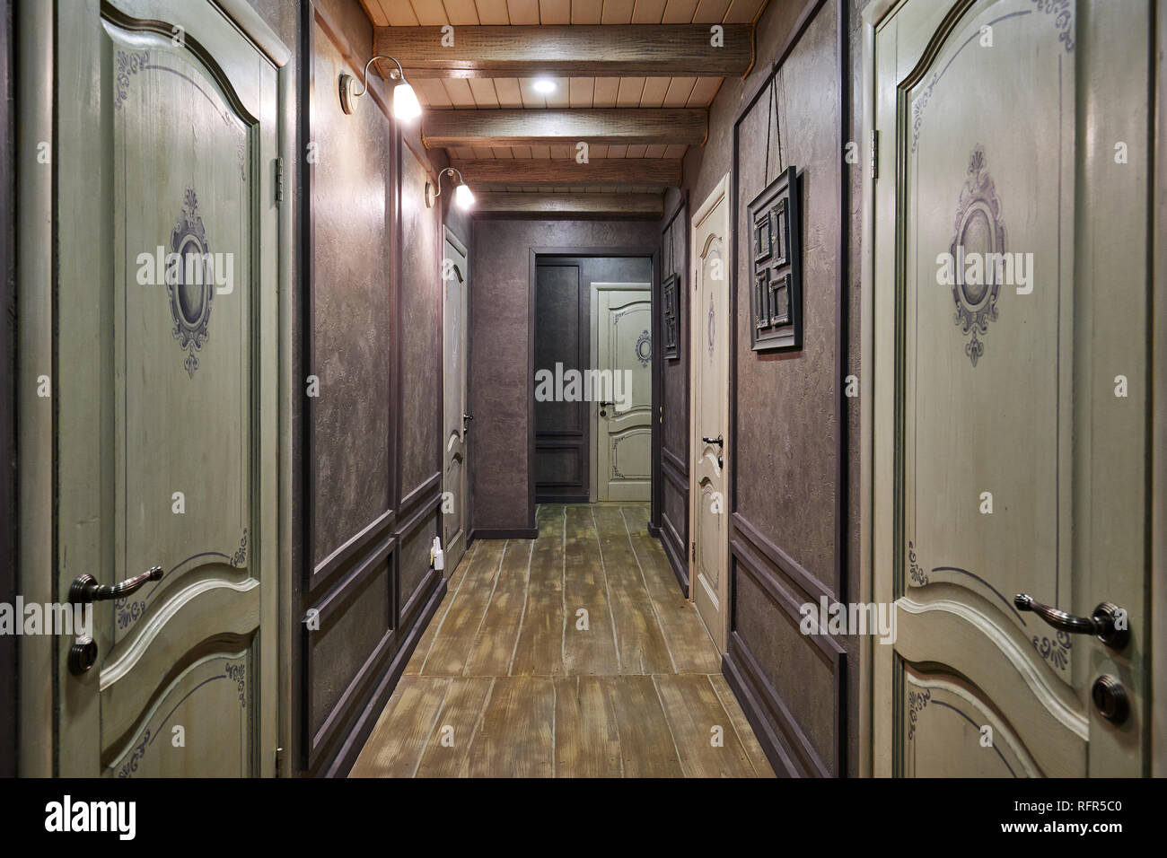 beautiful hallway with doors in dark colors Stock Photo Alamy