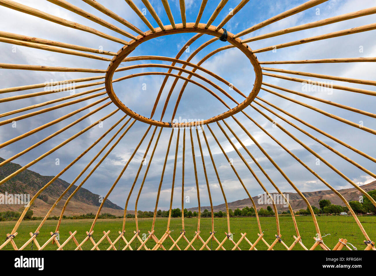 Wooden beams and dome of a nomadic tent known as yurt, under construction, in Kazakhstan Stock Photo