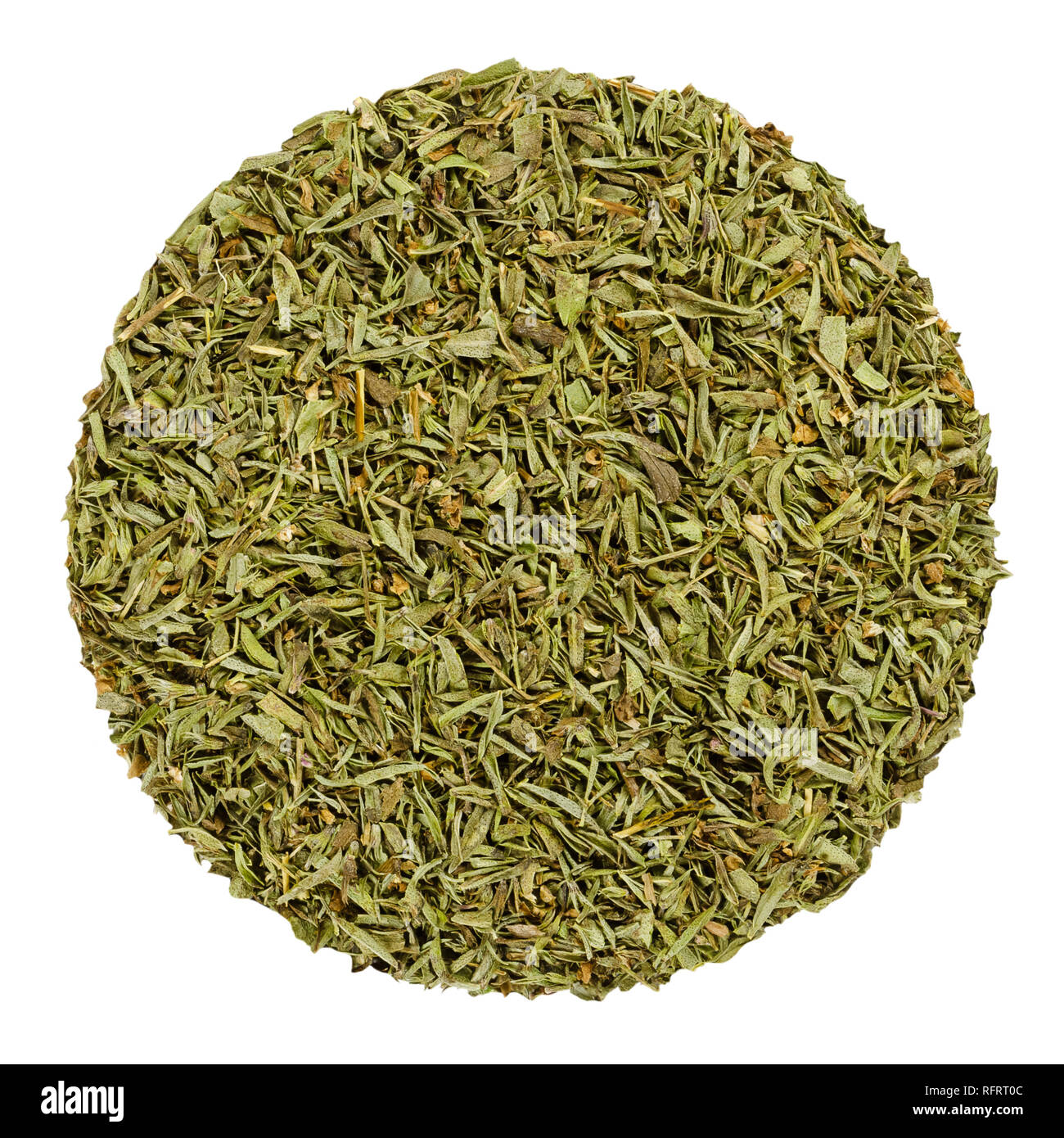 Dried savory. Herb circle from above isolated over white. Disc made of chopped summer savory, Satureja hortensis, a green herb and seasoning. Stock Photo