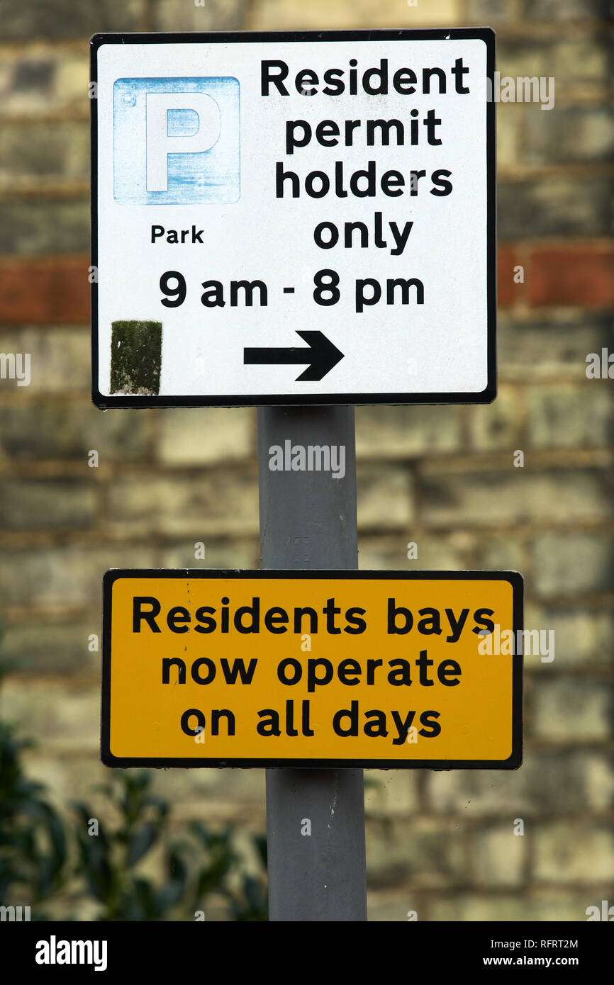 Permit holders only car parking on road monday to friday • wall stickers  signage, permit, caution
