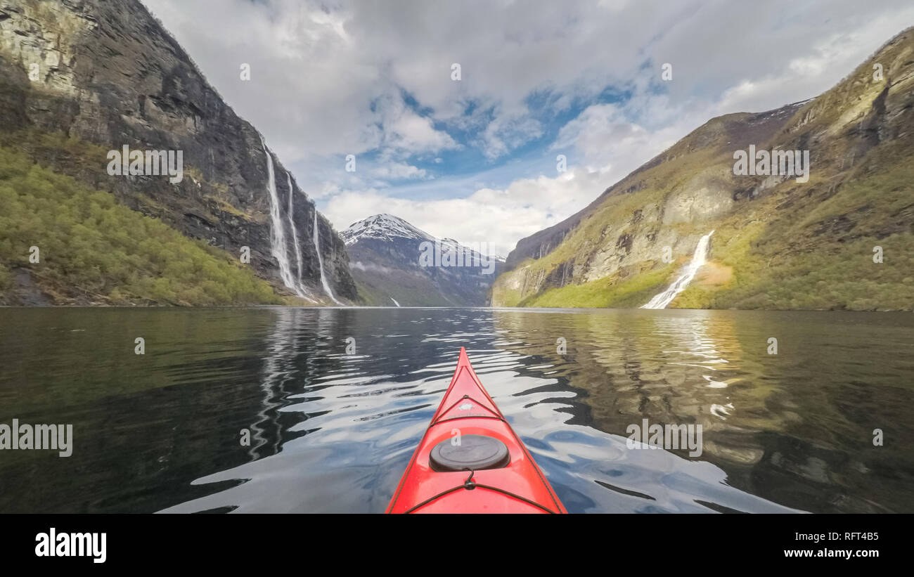 Kayaking in Geirangerfjord a Unesco World Heritage Site, Norway Stock Photo