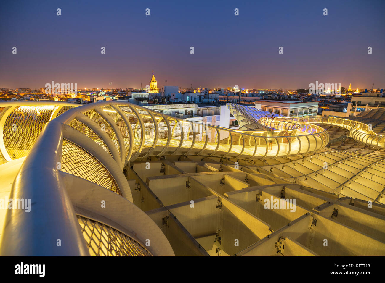 Illuminated spiral curved walkways on rooftop of the Metropol Parasol, Plaza de la Encarnacion, Seville, Andalusia, Spain, Europe Stock Photo