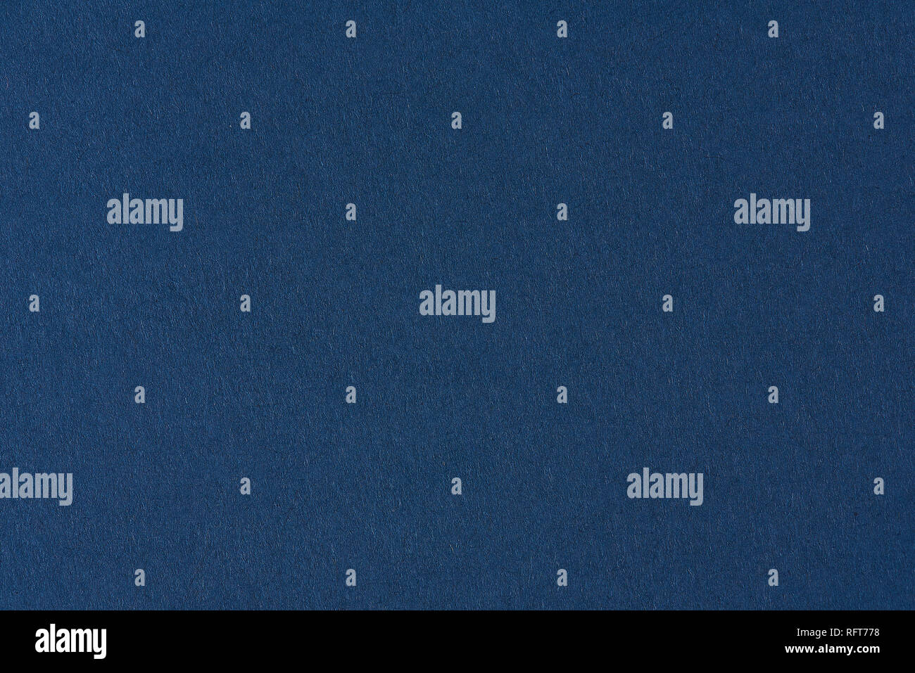 Dark blue seamless paper background close up view Stock Photo