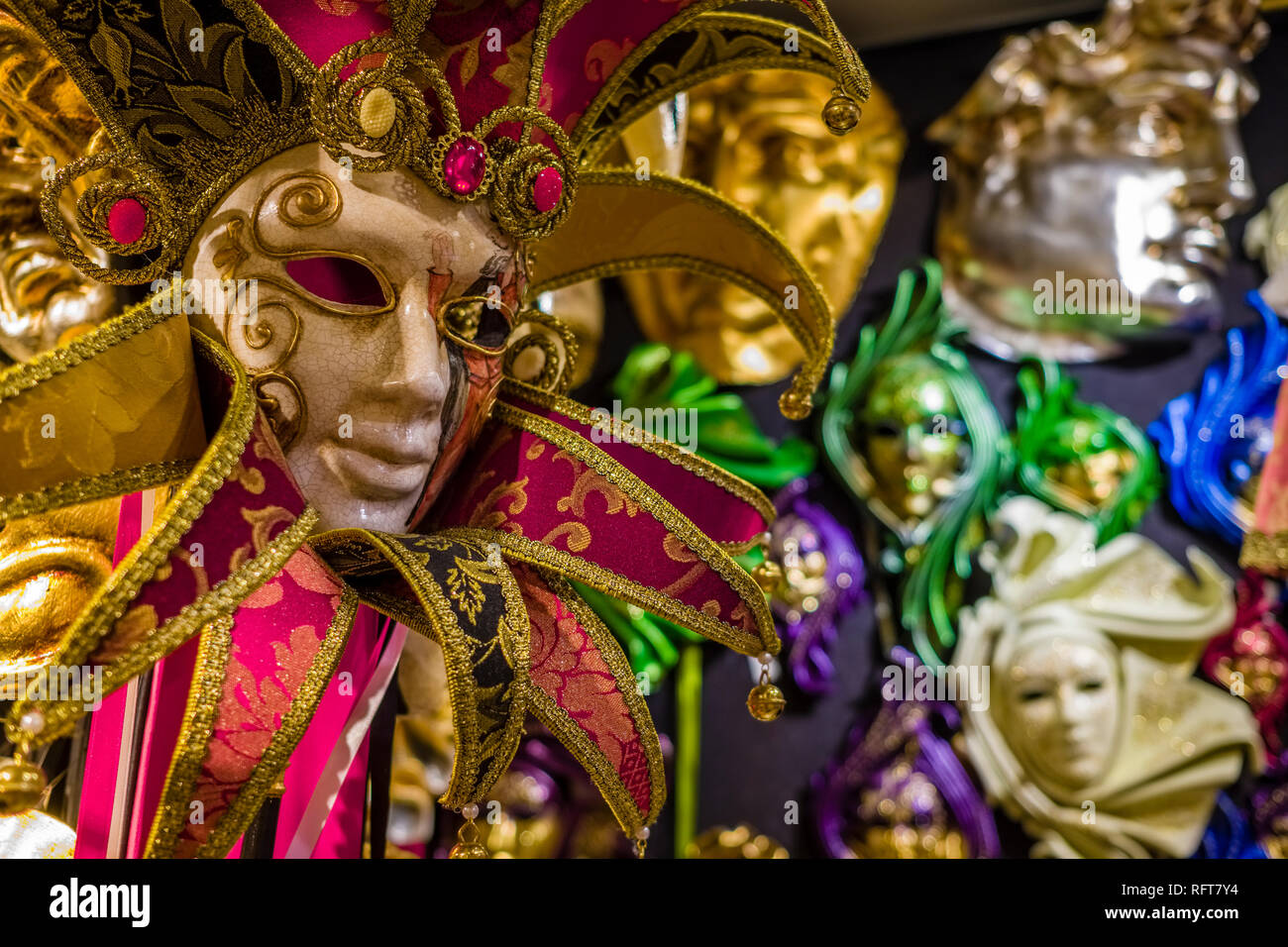 Artful and colorful masks for the Carnival of Venice, Carnevale di Venezia, are displayed in a shop for sale Stock Photo