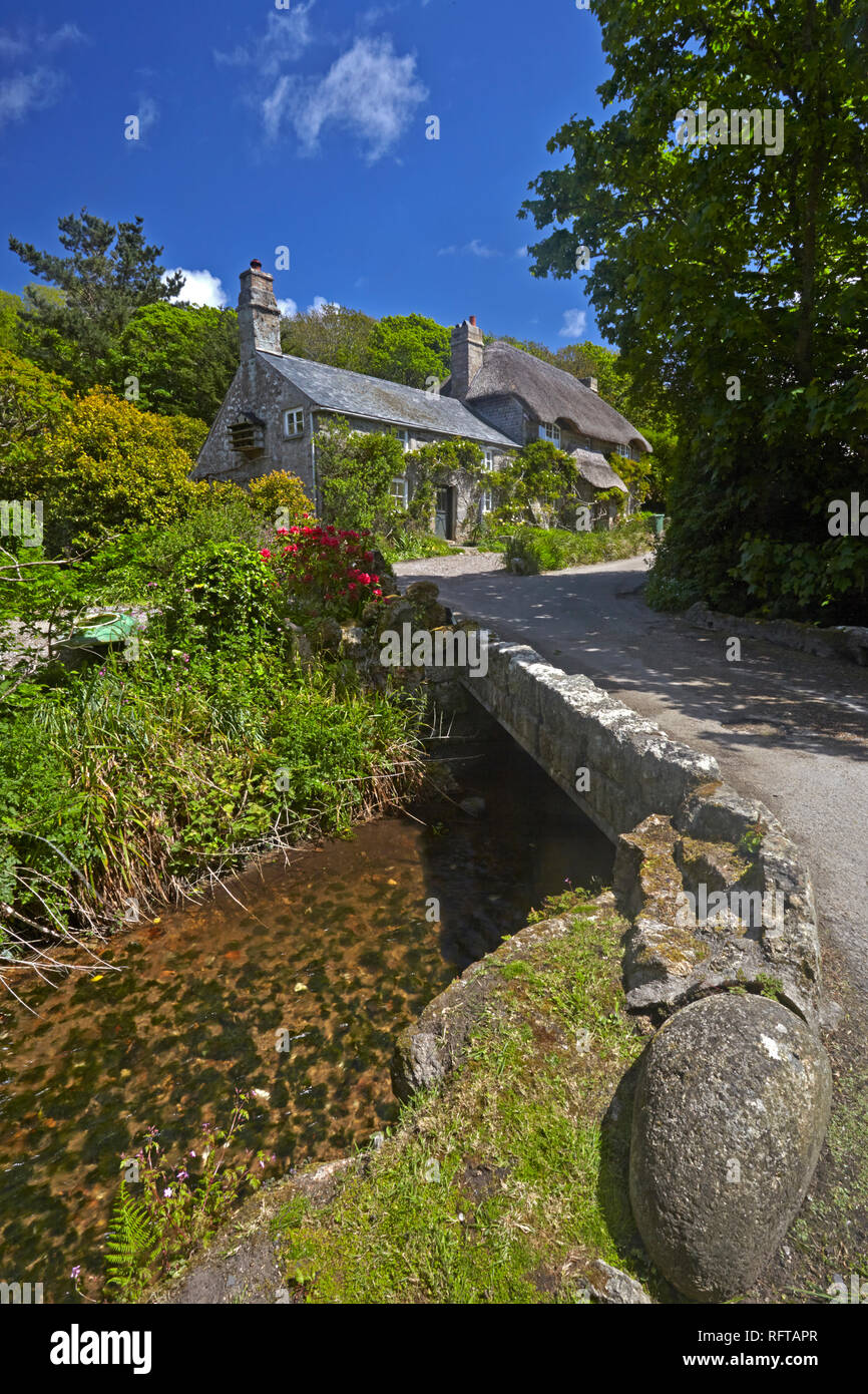 A thatched Cornish cottage on the road to Penberth Cove, Cornwall, England, United Kingdom, Europe Stock Photo