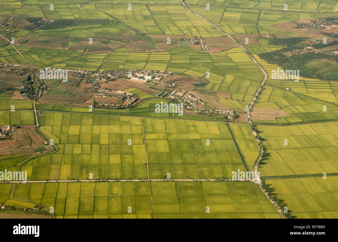 Village, rice paddies and farmland near Hambong, Hamgyong Province, North Korea, Asia Stock Photo