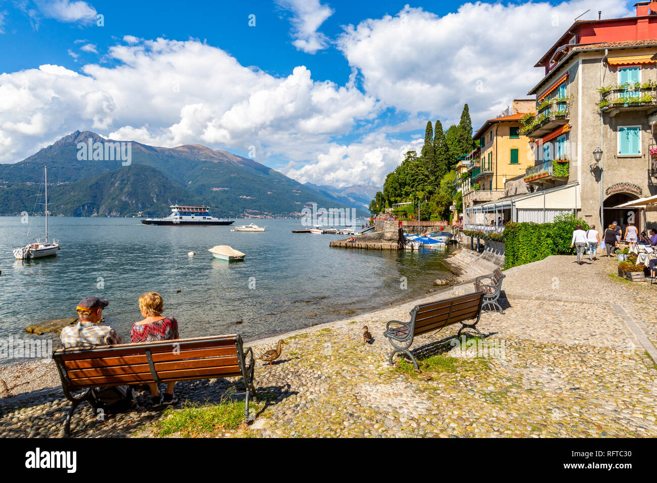 View of visitors on the lakeside in Vezio, Province of Como, Lake Como, Lombardy, Italian Lakes, Italy, Europe Stock Photo