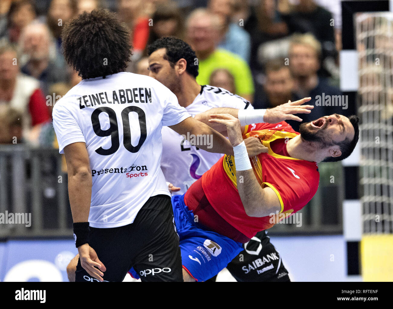 Herning, Denmark. 26th Jan, 2019. Gedeon Guardiola Vilaplana (30), Spain is blocked by Ali Zeinelabedin, Egypt and Ibrahim Elmasry, Egypt in the handball match for the 7th and 8th place between Spain and Egypt in Jyske Bank Boxen in Herning during the 2019 IHF Handball World Championship in Germany/Denmark. Credit: Lars Moeller/ZUMA Wire/Alamy Live News Credit: ZUMA Press, Inc./Alamy Live News Stock Photo