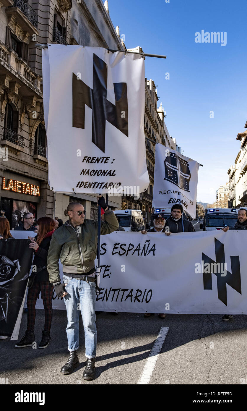 Barcelona, Spain. 26th January, 2019. Members of the extreme right National Identity Front group are seen during the demonstration.Only a few followers have attended to the call of the ultra-right ''˜We Recover Spain-National Identity Front' that was intended to celebrate the 80th anniversary of the entry of Francoist troops in Barcelona that ended the Spanish Civil War. Antifascists occupied the Plaza Sant Jaume for one hour where it was intended to celebrate the commemoration. Finally the police intervened to stop the anti-fascist protest. Credit: ZUMA Press, Inc./Alamy Live News Stock Photo