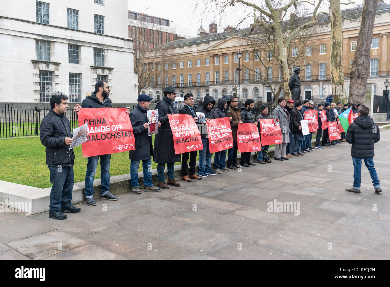 London, UK. 26th January 2019. The Baloch Republican Party UK protested opposite Downing St demanding the release of missing persons in Balochistan, abducted by the Pakistan army and to support the mothers and sisters of missing persons on hunger strike in the Quetta Press Club. They say Baloch people from every intellectual field are being abducted and mutilated dead bodies being discovered on a daily basis. Balochistan is the largest of Pakistan's four provinces and its incorporation into Pakistan was highly contested after independence. Credit: Peter Marshall/Alamy Live News Stock Photo