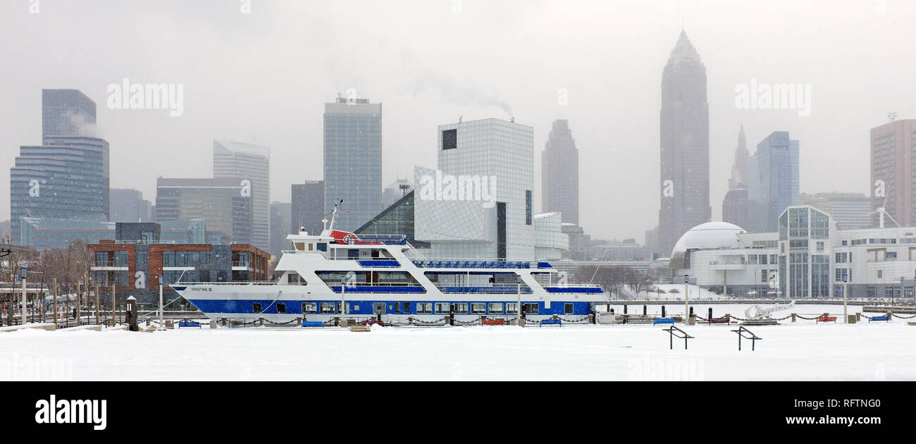Cleveland, Ohio, USA. 26th Jan, 2019.  The downtown Cleveland skyline and cityscape in the midst of a snowstorm that has brought snow and extremely low temperatures to the area is a typical January scene for this Northeast Ohio city.  Credit: Mark Kanning. Credit: Mark Kanning/Alamy Live News Stock Photo