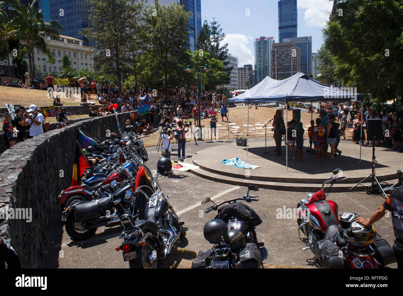 The motorcycles belonging to the Indigenous Riders Club of South East Queensland at the Invasion Day protest.  On the 26th of January, many Australians celebrate Australia day, but to many indigenous Australian people, it is a day synonymous with decades of systematic abuse and genocide. Several thousand protesters took the streets in Brisbane (known as Meanjin by local indigenous people) to rally for sovereignty rights and date changes. Stock Photo