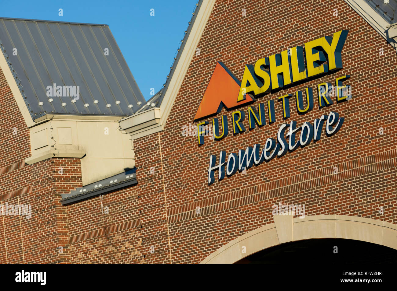 A logo sign outside of a Ashley Furniture HomeStore retail store in Frederick, Maryland, on January 22, 2019. Stock Photo