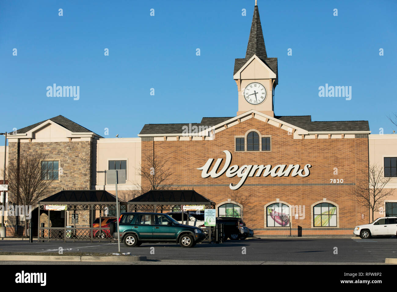 A logo sign outside of a Wegmans Food Markets grocery store in Frederick, Maryland, on January 22, 2019. Stock Photo