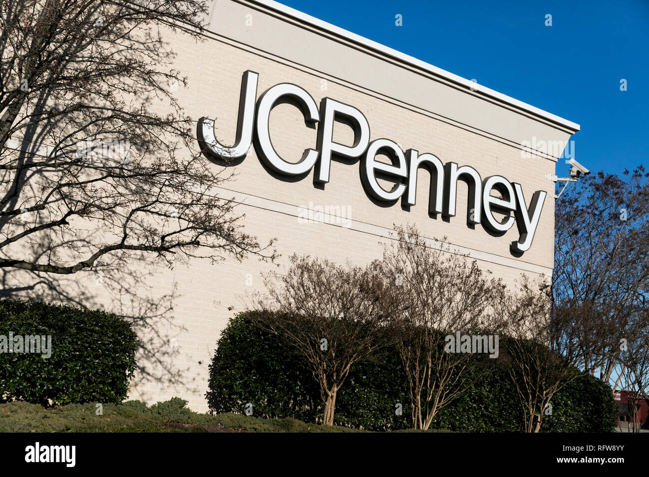 A logo sign outside of a JCPenney retail store location in Frederick ...