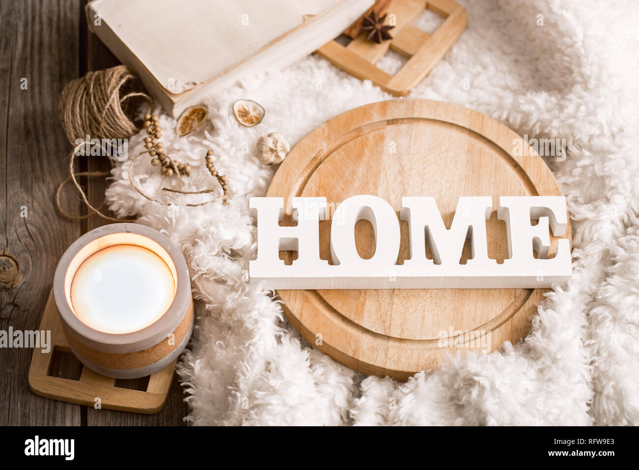 Cozy Home Decor Items With Wooden Letters Candle And Book On The Background Of Beautiful White Plaid Home Atmosphere Concept Stock Photo Alamy