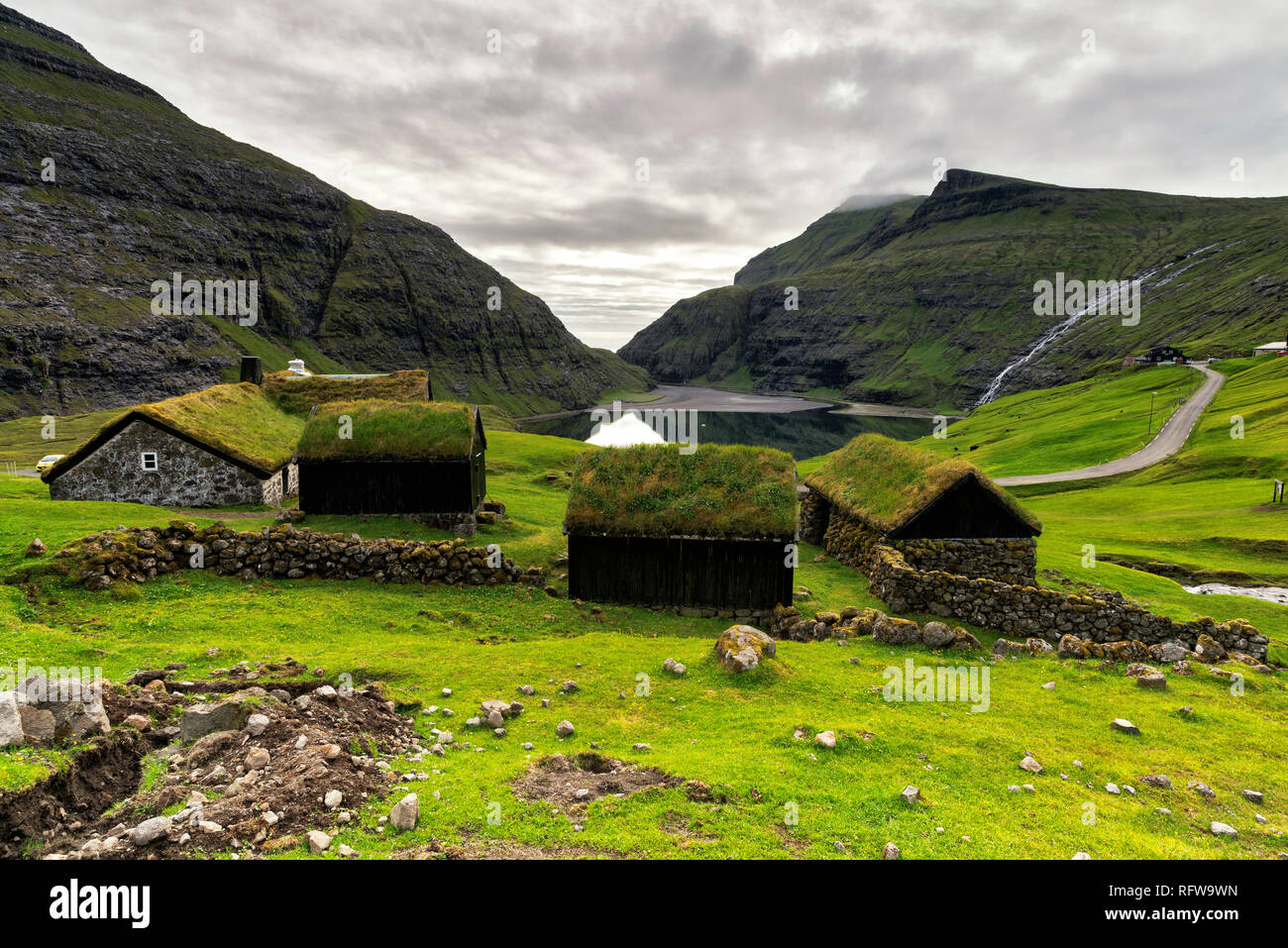 Traditional houses with grass roof, Saksun, Streymoy island, Faroe Islands, Denmark, Europe Stock Photo
