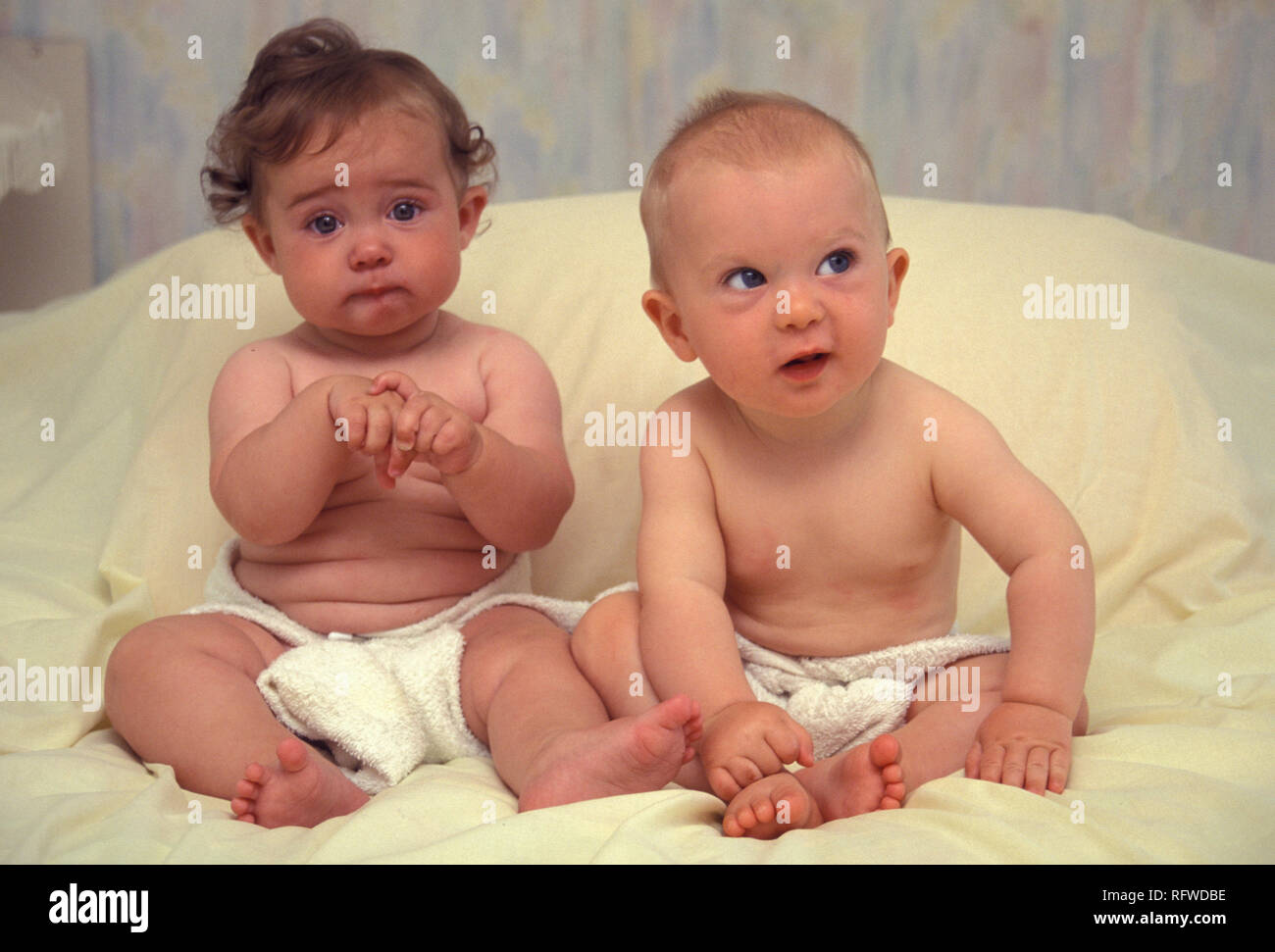 two babies fighting Stock Photo