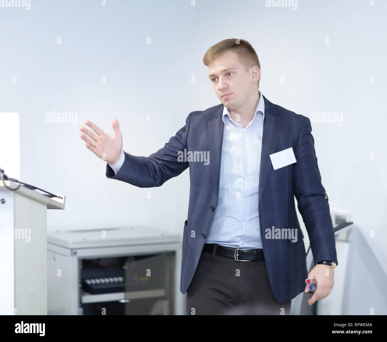 Plan on table with male hand pointing hi-res stock photography and ...