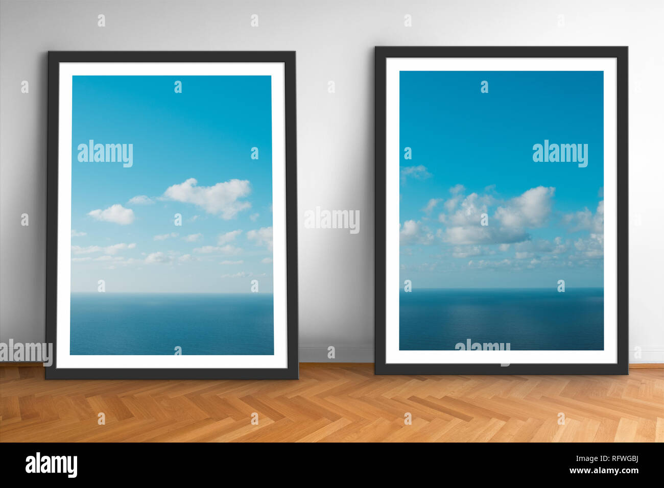 framed picture prints of ocean and blue sky landscape photography on wooden floor Stock Photo