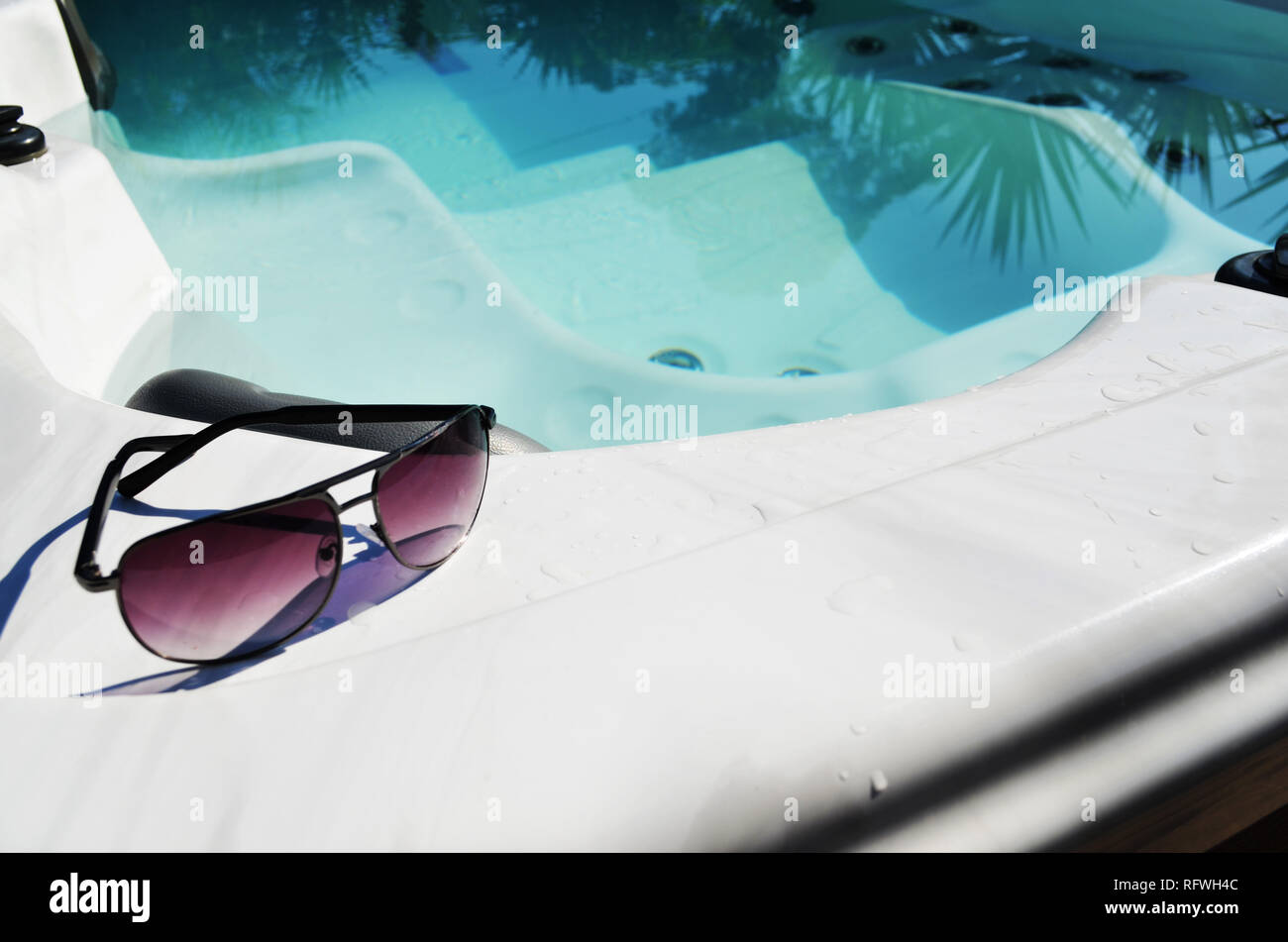 Swim spa with sunglasses Stock Photo