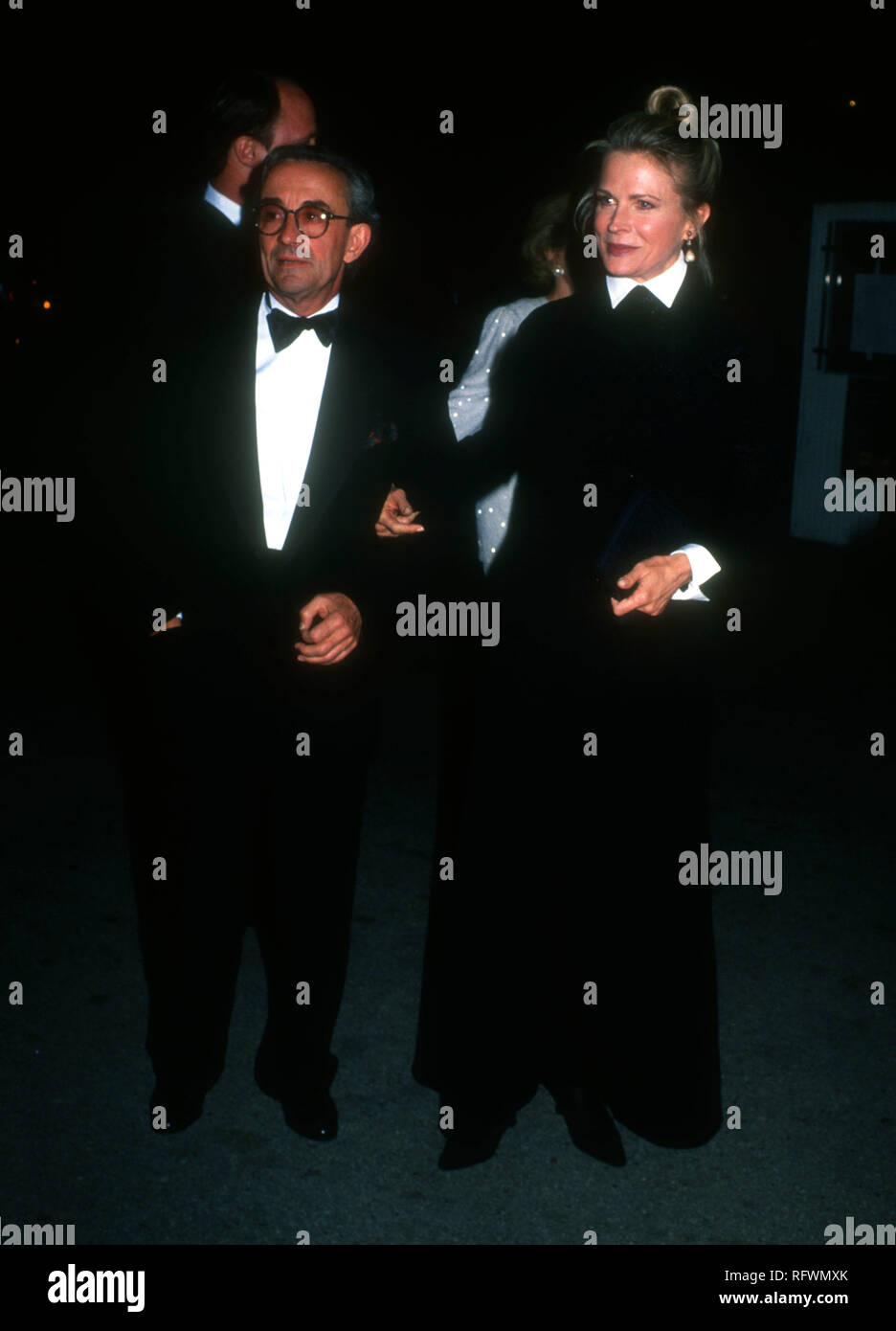 HOLLYWOOD, CA - NOVEMBER 13: Director Louis Malle, and wife actress Candice Bergen attend the Hollywood Entertainment Museum's Fifth Annual Legacy Awards on November 13, 1993 at the Hollywood Palladium in Hollywood, California. Photo by Barry King/Alamy Stock Photo Stock Photo
