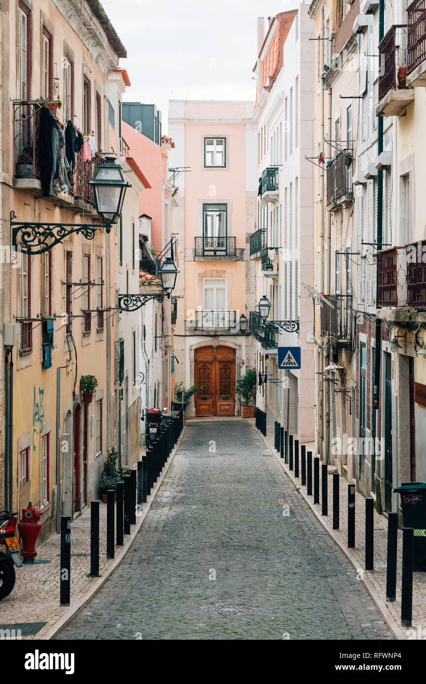 A narrow, colorful street in Bairro Alto, Lisbon, Portugal Stock Photo ...