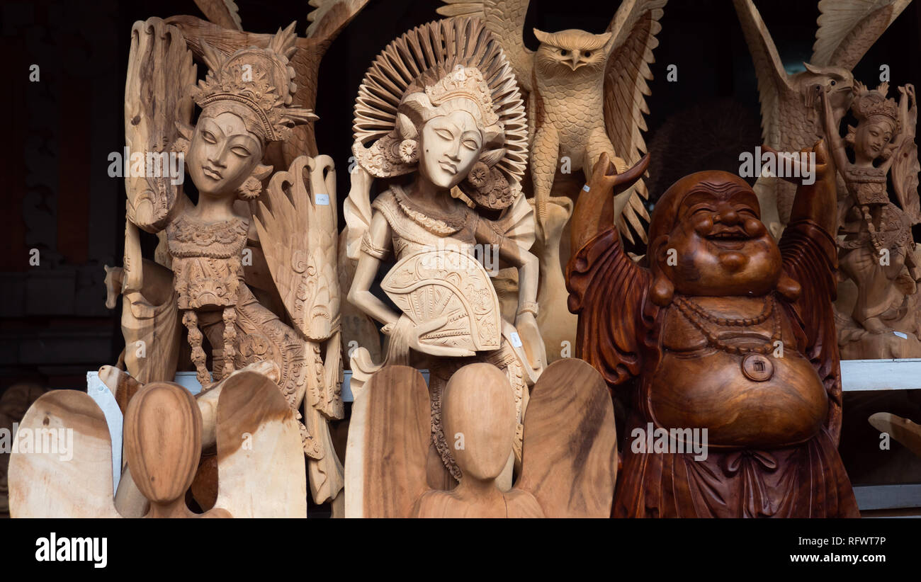 Hindu and Buddhist wooden carving. souvenir shop selling souvenirs and handicrafts of Bali at