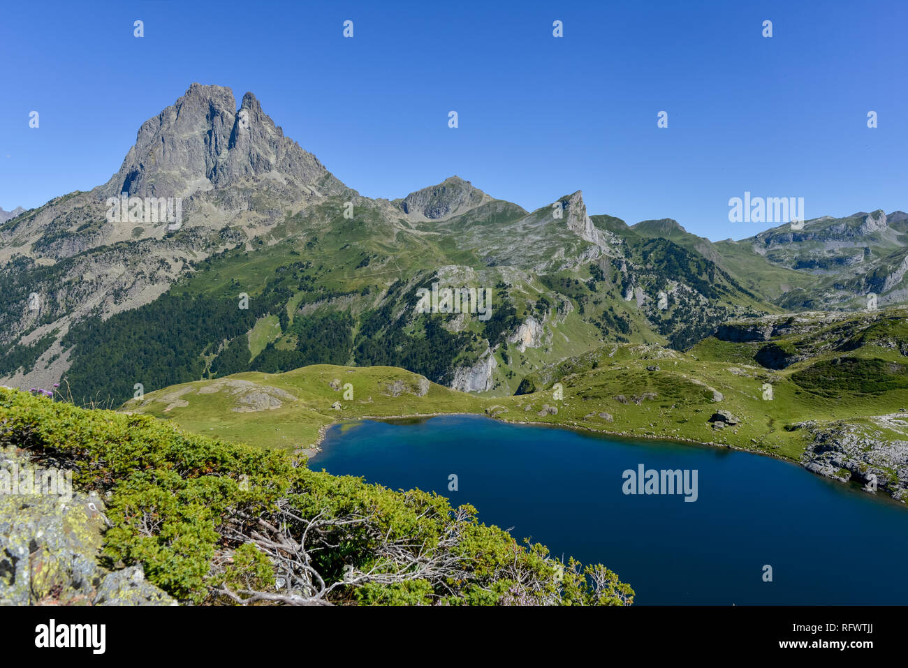 Lac du Miey and Pic Midi d'Ossau seen from the GR10 hiking trail in the French Pyrenees, Pyrenees Atlantiques, France, Europe Stock Photo