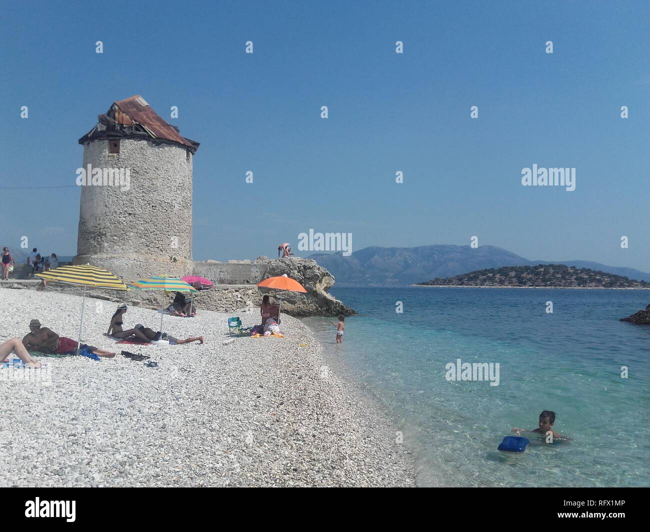 sea beach in Greece Kalamos island  Holiday summer sand blue sky Stock Photo