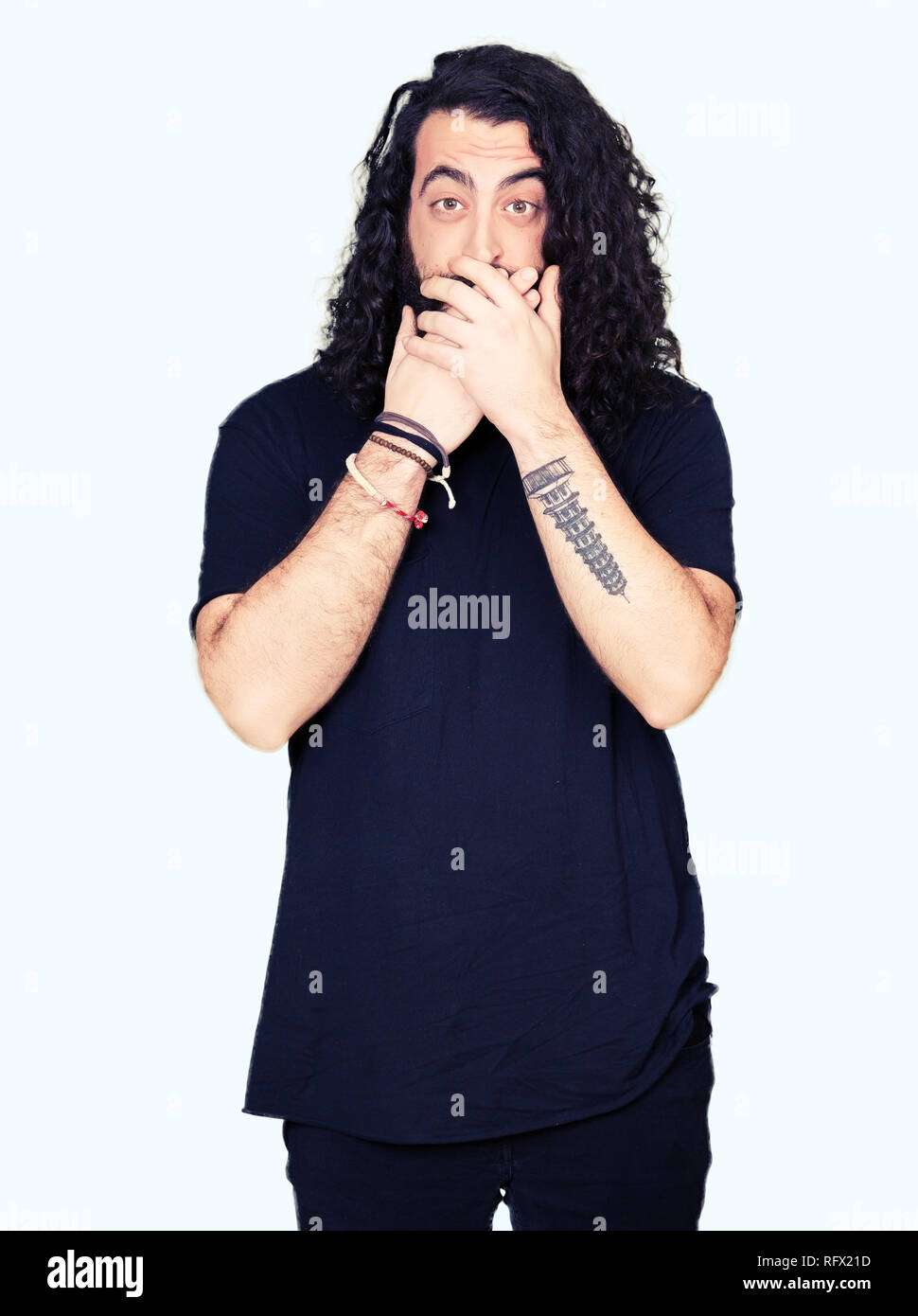 Young Man With Long Hair And Beard Wearing Heavy Metal Black