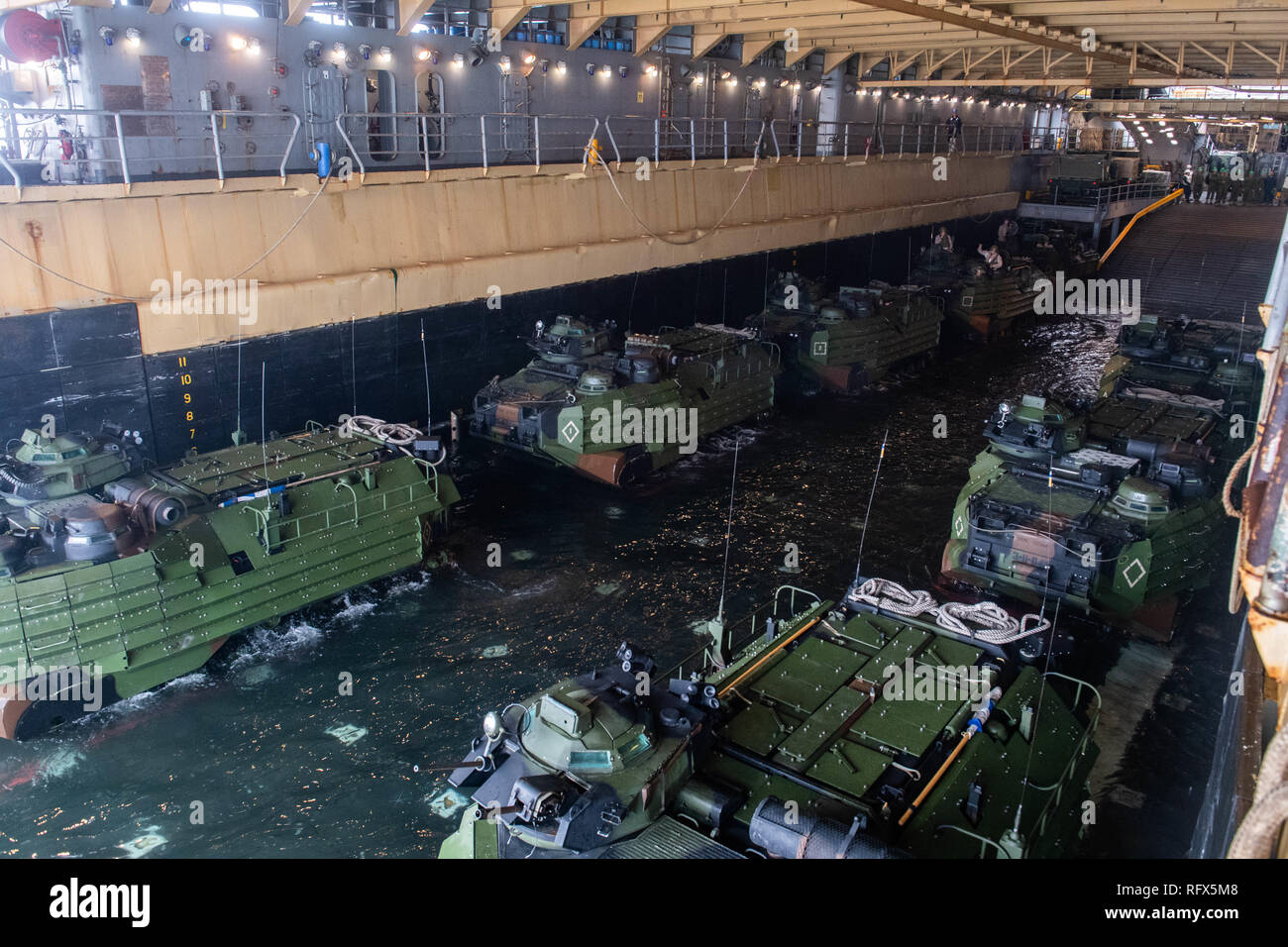190116-N-HD110-0057  PACIFIC OCEAN (Jan. 16, 2019) Assault amphibious vehicles attached to Battalion Landing Team 3rd Battalion, 5th Marine Regiment, 11th Marine Expeditionary Unit standby to exit the well deck of the Harpers Ferry-class amphibious dock landing ship USS Harpers Ferry (LSD 49) during a training exercise. Harpers Ferry is underway conducting routine operations as a part of USS Boxer Amphibious Ready Group (ARG) in the eastern Pacific Ocean. (U.S. Navy photo by Mass Communication Specialist 3rd Class Danielle A. Baker) Stock Photo