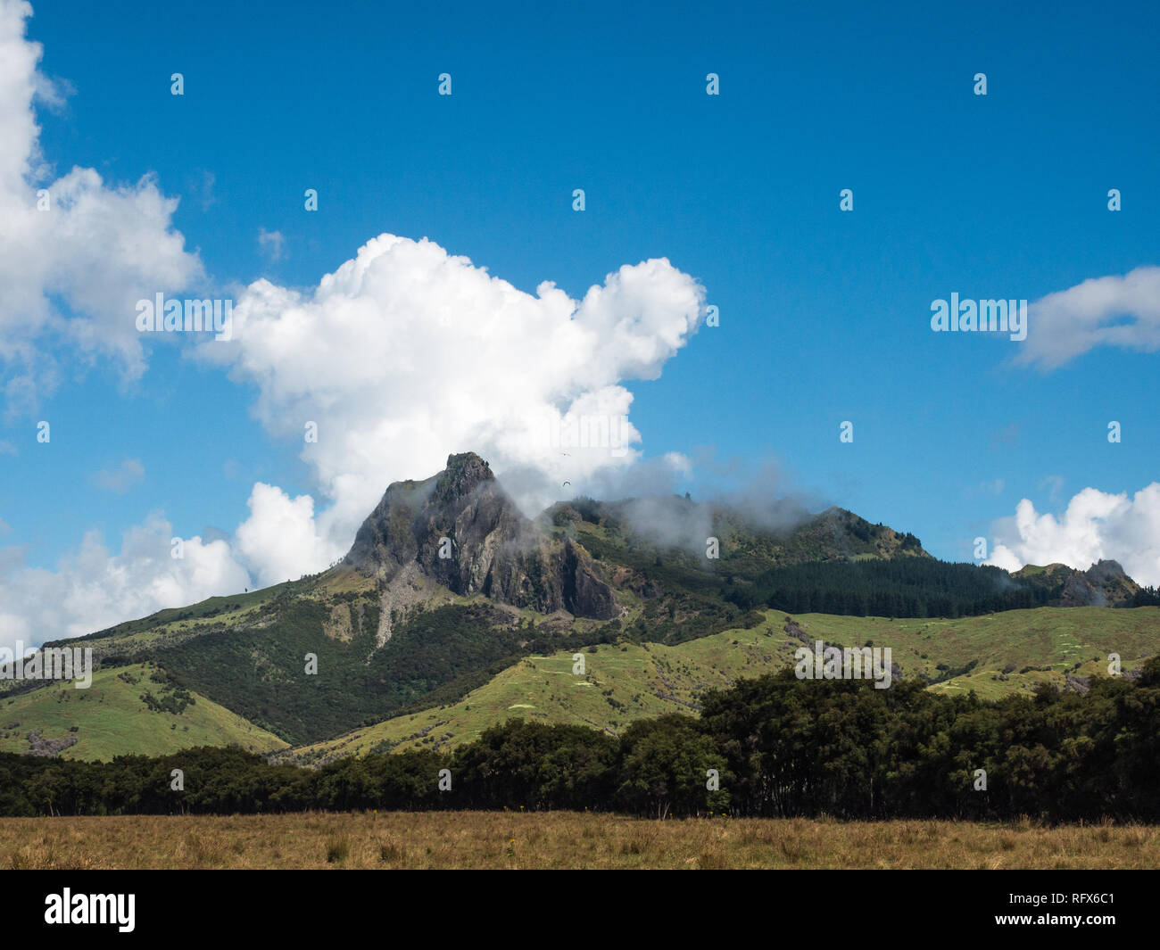 Rocky hill, back country landscape with clouds, Tapuaeroa Valley, East Cape, North Island, New Zealand Stock Photo