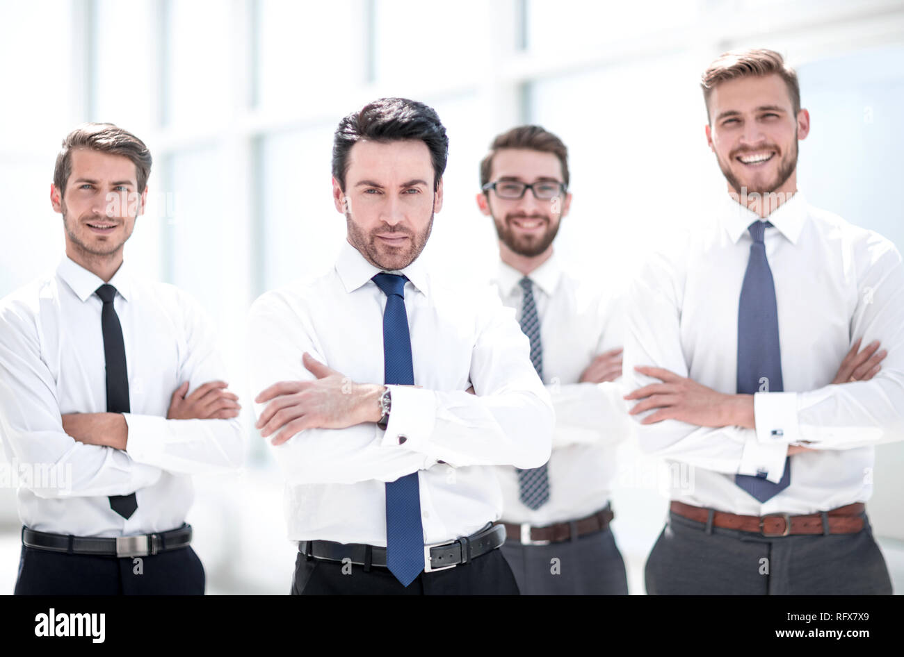 professional business team standing in the office Stock Photo - Alamy