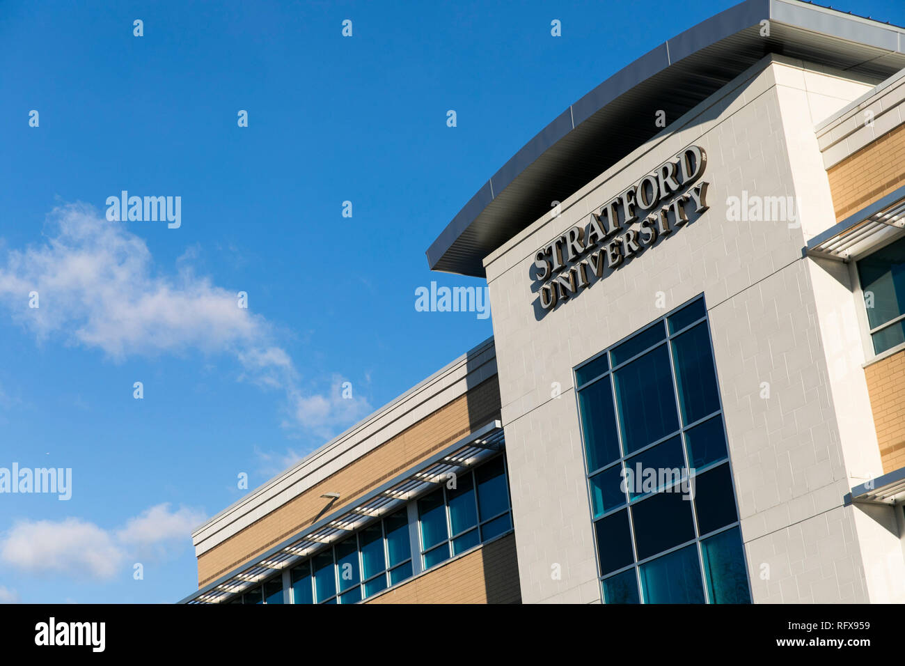 A logo sign outside of a facility occupied by Stratford University in