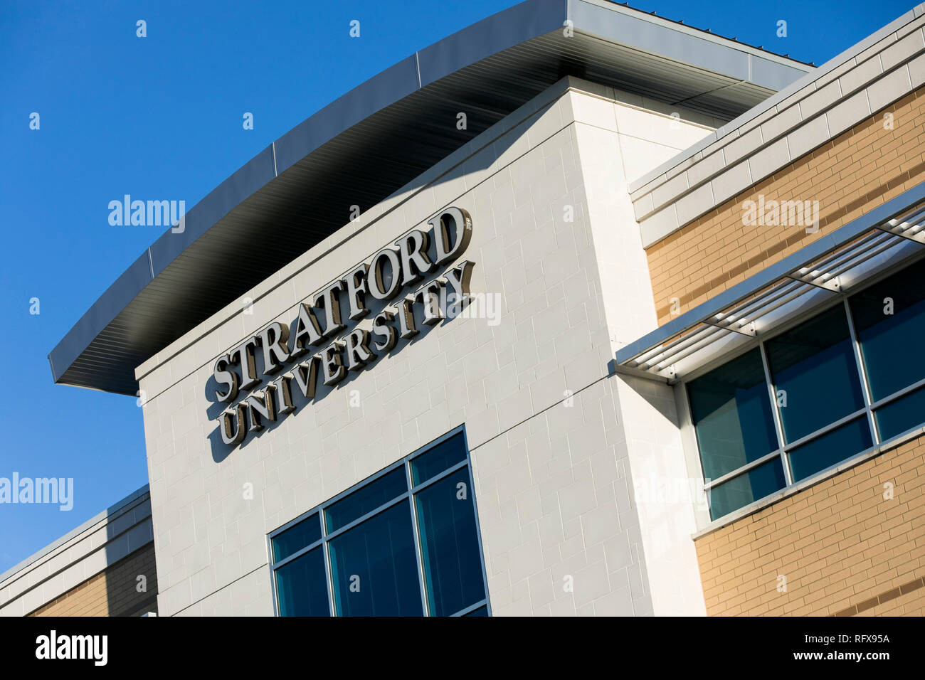 A logo sign outside of a facility occupied by Stratford University in
